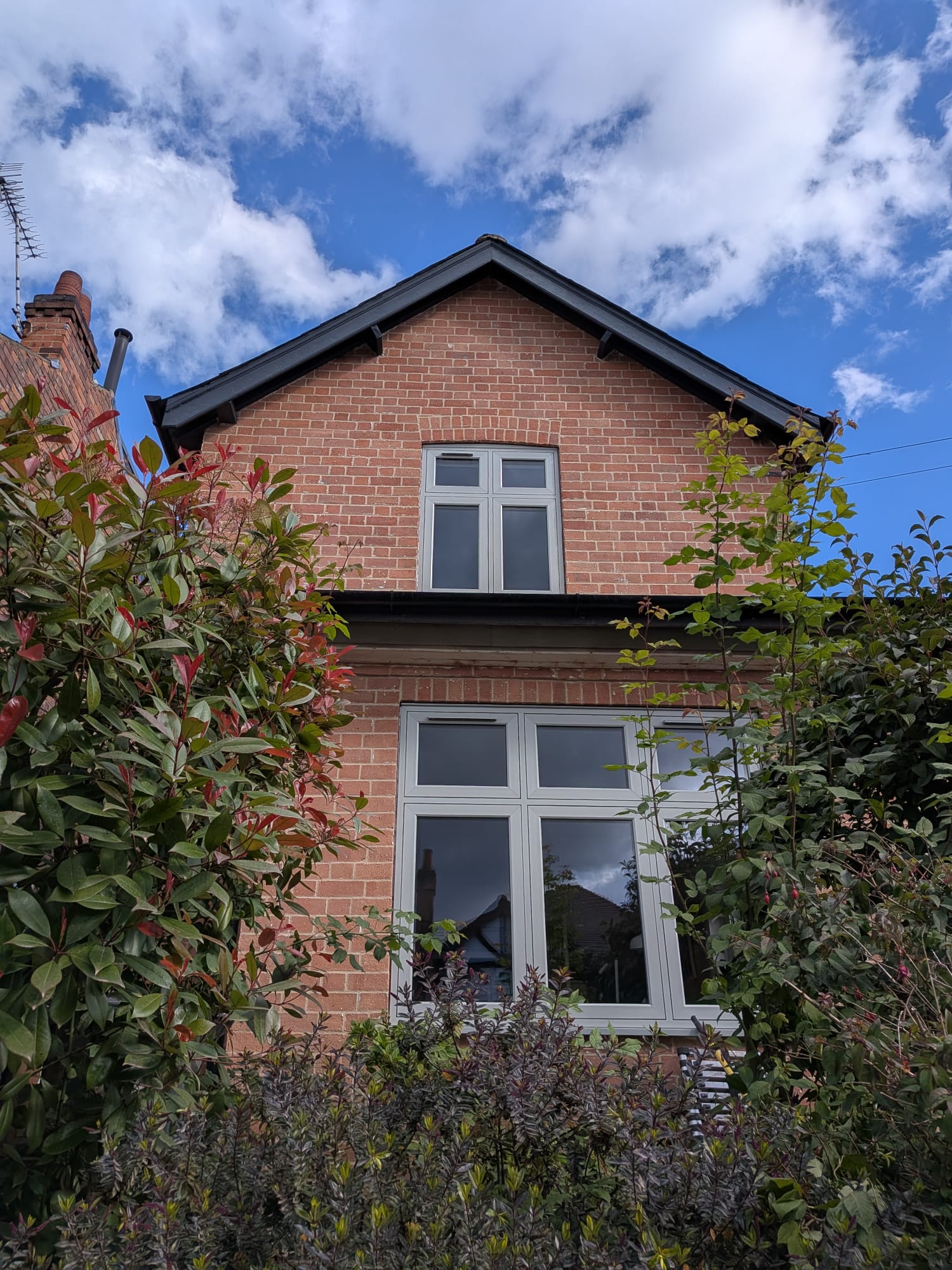 Before and after of house that has been repointed
